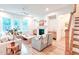 Cozy living room offers a fireplace, relaxed seating, and bright windows that create an inviting atmosphere at 642 The Parks Dr, Pittsboro, NC 27312