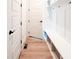 Functional mudroom with bench seating, storage cubbies, and hooks provides a tidy transition space at 642 The Parks Dr, Pittsboro, NC 27312