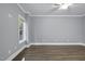 Bedroom with a ceiling fan and a window providing natural light at 7312 Hasentree Way, Wake Forest, NC 27587