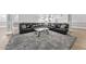 Spacious living room with a cozy sectional sofa and unique coffee table at 7312 Hasentree Way, Wake Forest, NC 27587
