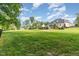 Extensive backyard offers plenty of green space with potential for recreation and enjoying outdoor activities at 8017 Discovery Falls Trl, Wake Forest, NC 27587