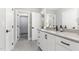 Bathroom featuring gray countertops, white cabinets, and a shower with curtain at 8017 Discovery Falls Trl, Wake Forest, NC 27587