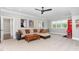 Living room with a comfortable sectional sofa, movie posters, and a soda machine at 8017 Discovery Falls Trl, Wake Forest, NC 27587