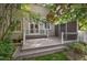 Outdoor deck with backyard, wooden railings, and shaded areas, ideal for relaxation at 9251 Palm Bay Cir, Raleigh, NC 27617
