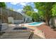 Charming backyard with an in-ground pool, deck and beautiful landscaping at 1000 Lamond Ave, Durham, NC 27701