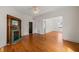 Living room with hardwood floors, a decorative fireplace, and a doorway leading to another room at 1000 Lamond Ave, Durham, NC 27701