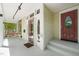 Inviting front porch with a combination of a screen door and a beautiful wooden door at 1000 Lamond Ave, Durham, NC 27701