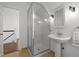 Bathroom featuring glass shower, sink, tiled flooring, and a mirror at 10003 Fountain, Chapel Hill, NC 27517