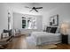 Relaxing bedroom with large windows and plush decor at 10003 Fountain, Chapel Hill, NC 27517