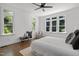 Bright bedroom with hardwood floors, neutral tones, and natural light at 10003 Fountain, Chapel Hill, NC 27517