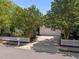 Well-maintained home with a two-car garage, ample driveway space, and a white picket fence at 10003 Fountain, Chapel Hill, NC 27517