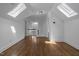 Bright hallway featuring hardwood floors and natural light from skylights at 10003 Fountain, Chapel Hill, NC 27517