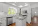 Beautiful kitchen featuring granite countertops and stainless steel appliances at 10003 Fountain, Chapel Hill, NC 27517
