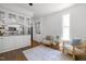 Bright living area with hardwood floors, kitchen access, and natural light at 10003 Fountain, Chapel Hill, NC 27517