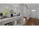 Bright living room with large windows, fireplace, and hardwood floors at 10003 Fountain, Chapel Hill, NC 27517