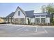 The clubhouse features a well-maintained parking lot and landscaped surroundings at 1021 Greatland Rd, Durham, NC 27703