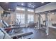 Well-equipped gym featuring modern machines, weights, and a water cooler to accommodate fitness enthusiasts at 1021 Greatland Rd, Durham, NC 27703