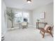 A bright home office featuring neutral walls, a desk and chair, decor, and carpet at 1021 Greatland Rd, Durham, NC 27703
