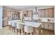 Modern kitchen with stainless steel appliances, a large island, and stylish cabinetry at 1021 Greatland Rd, Durham, NC 27703