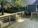 Back deck, perfect for outdoor enjoyment and entertaining, overlooking a well-kept lawn at 103 Romaine Ct, Cary, NC 27513