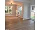 Dining room with modern chandelier and hardwood flooring at 103 Romaine Ct, Cary, NC 27513