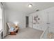 Calming bedroom with crib, glider chair, and neutral wall color at 104 Anderson Park Dr, Wake Forest, NC 27596