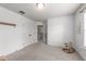 Open bedroom with neutral colors, window, and rocking horse accessories at 104 Anderson Park Dr, Wake Forest, NC 27596