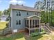 Charming two-story home with a screened-in porch and well-maintained backyard at 104 Anderson Park Dr, Wake Forest, NC 27596
