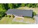 Aerial view of the home with a fenced backyard and mature trees at 1041 Davis Dr, Apex, NC 27523