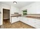 Kitchen showcases white cabinets and updated countertops at 1041 Davis Dr, Apex, NC 27523