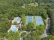 Aerial view featuring community amenities: pool and tennis courts at 105 Sundew Ln, Cary, NC 27518