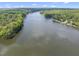 Breathtaking aerial view showcasing the wide expanse of the lake at 105 Sundew Ln, Cary, NC 27518