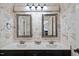 Bathroom with double sinks, granite countertops, and vintage-style wallpaper at 105 Sundew Ln, Cary, NC 27518
