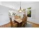 Bright dining area adjacent to the kitchen, featuring a window at 105 Sundew Ln, Cary, NC 27518