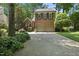 Charming brick home featuring a two-car garage, manicured landscaping and inviting curb appeal at 105 Sundew Ln, Cary, NC 27518
