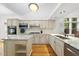Well-appointed kitchen with granite counters, stainless appliances, and a center island at 105 Sundew Ln, Cary, NC 27518