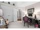 Office featuring a dark desk, closet, neutral walls and light colored carpet at 106 Clendenen Ct, Cary, NC 27513