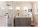 Well-lit bathroom featuring a glass shower, subway tile, and a gray vanity with drawers at 107 N Guthrie Ave, Durham, NC 27703