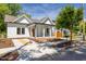Charming home exterior with a welcoming porch, modern landscaping, and inviting curb appeal at 107 N Guthrie Ave, Durham, NC 27703