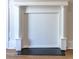 Elegant white fireplace features a mantel, hearth, and ornate columns at 107 N Guthrie Ave, Durham, NC 27703