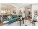 Spacious living room open to dining, featuring hardwood floors and an open concept at 107 N Guthrie Ave, Durham, NC 27703