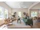 Inviting living room with large windows, comfortable seating, and an open floor plan at 107 N Guthrie Ave, Durham, NC 27703