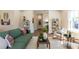 Open-concept living room with stylish decor, hardwood floors, and neutral paint at 107 N Guthrie Ave, Durham, NC 27703