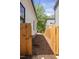 Narrow side yard with privacy fence providing a secure and private outdoor space at 107 N Guthrie Ave, Durham, NC 27703