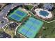 Aerial view of neighborhood tennis courts and swimming pool at 110 Bristolwood Cir, Morrisville, NC 27560