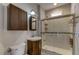 Updated bathroom features a single sink vanity, shower with glass door and tile surround at 110 Bristolwood Cir, Morrisville, NC 27560