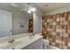 Bathroom with double sinks, large mirror and shower-tub with curtain at 110 Bristolwood Cir, Morrisville, NC 27560