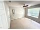 Comfortable bedroom with neutral carpet, ceiling fan, and a bright window at 110 Bristolwood Cir, Morrisville, NC 27560