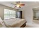 Neutral bedroom with a large window and closet at 110 Bristolwood Cir, Morrisville, NC 27560