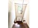 Elegant foyer with high ceilings, chandelier, and hardwood flooring at 110 Bristolwood Cir, Morrisville, NC 27560